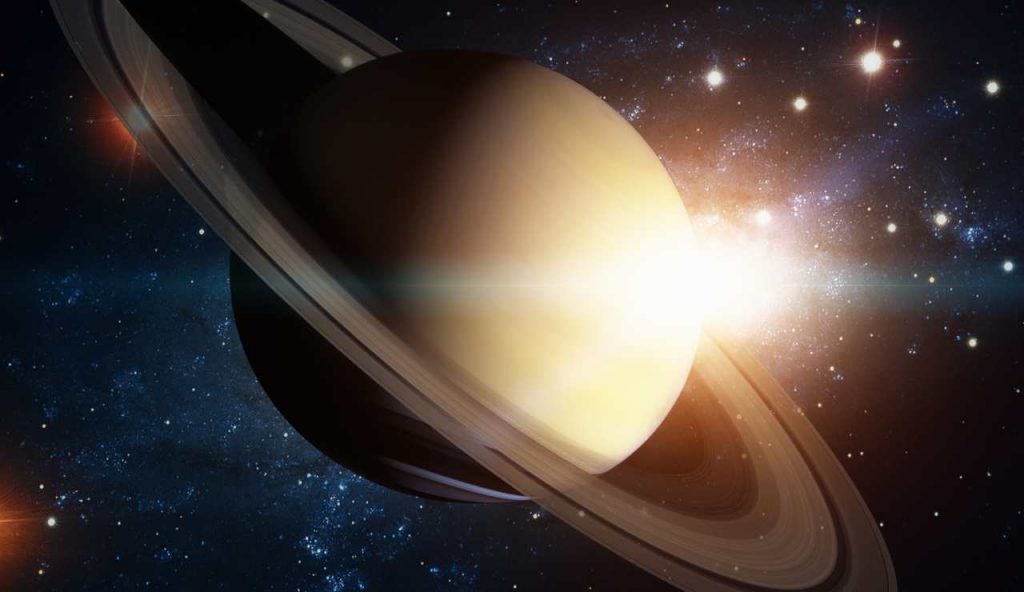 Saturno gioca a flipper con una Cometa